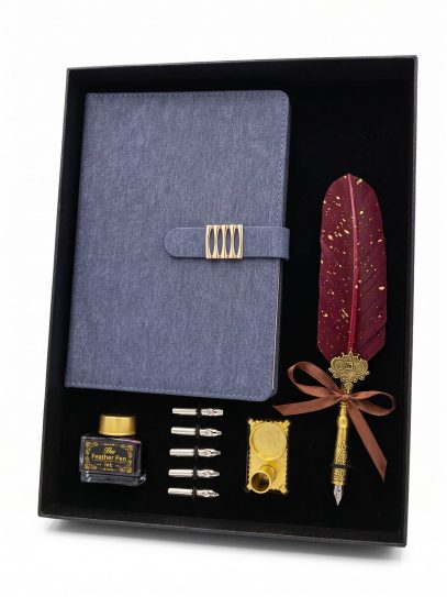 Gift set in a black box featuring a blue notebook with gold clasp, a burgundy feather quill, and gold writing accessories