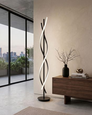 Contemporary living room corner with a sculptural twisted floor lamp beside a wooden console and a black vase with bare branches on top.
