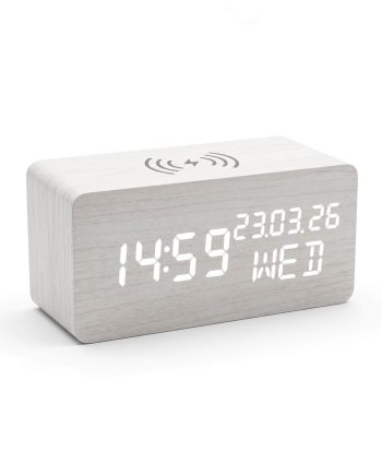 Wooden digital alarm clock showing 14:59 and date 23.03.26 with Wed, wireless charging symbol on top image is visible on a white background