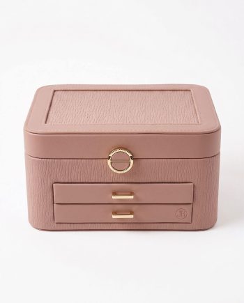 Pink leather jewelry box with a textured top panel and two small front drawers with gold handles.