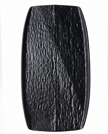 Close-up of a black, pebbled leather surface with a curved edge.