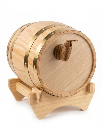 Small wooden barrel on a stand with brass bands and a tap, used for aging and pouring beverages like wine or whiskey.